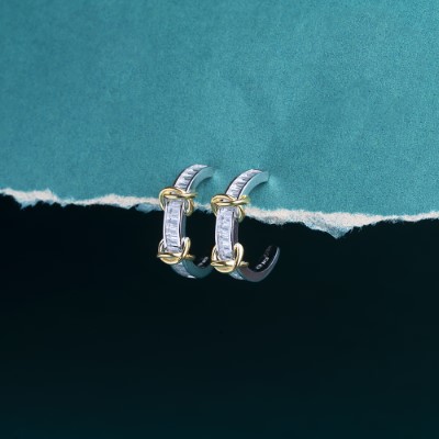 Reegalia Baguette Glow Huggie Earrings in 925 Silver.
