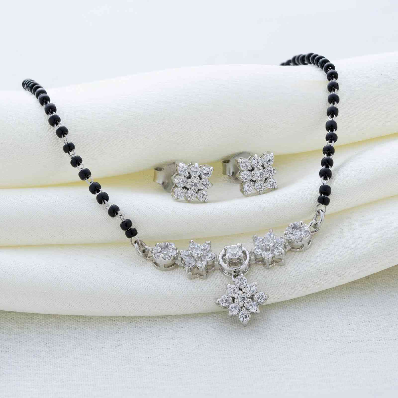 Elevate your elegance with this beautifully crafted 925 sterling silver mangalsutra set, featuring a delicate fusion of tradition and modern charm.
