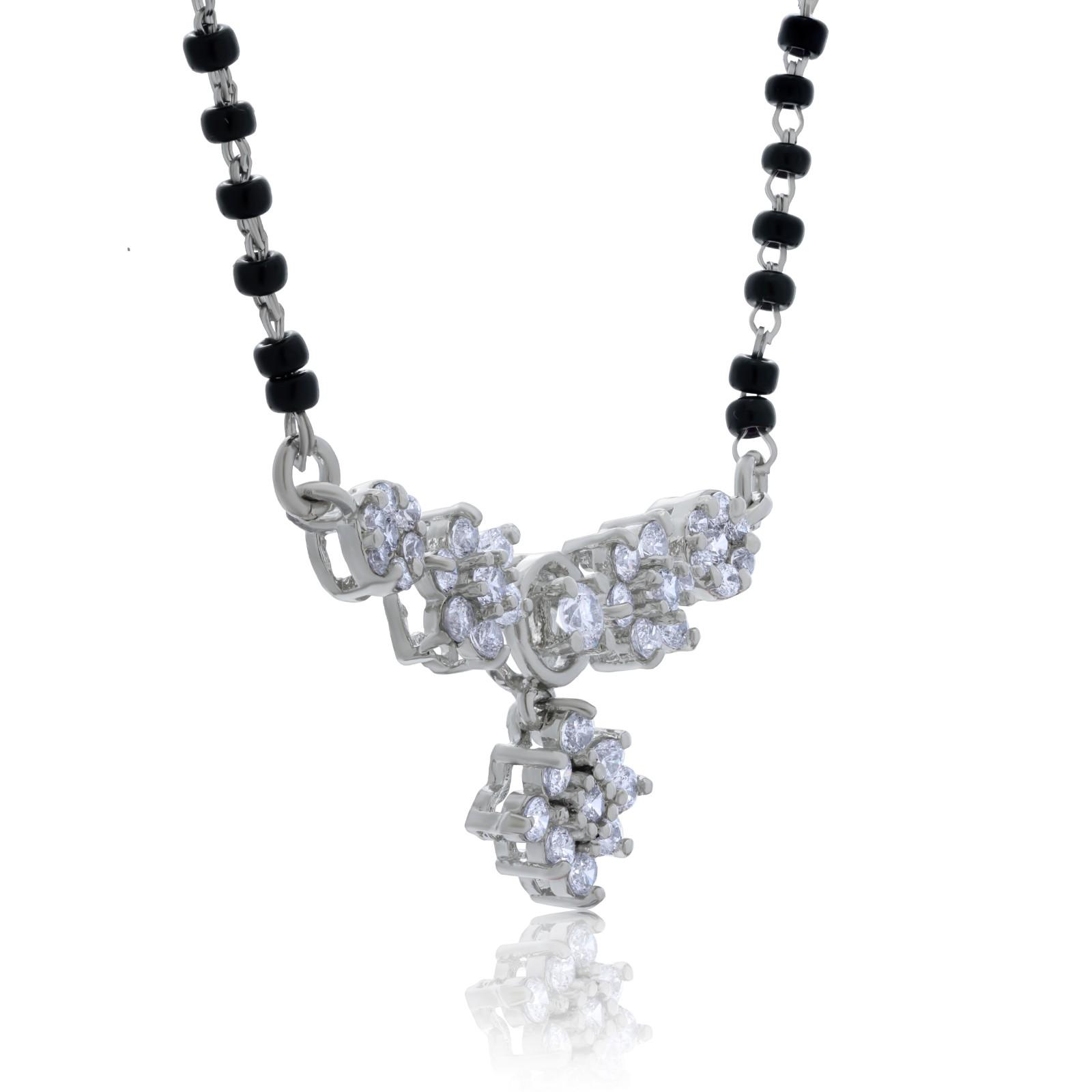 Elevate your elegance with this beautifully crafted 925 sterling silver mangalsutra set, featuring a delicate fusion of tradition and modern charm.